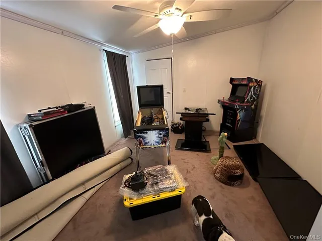 a room with furniture and flat screen tv