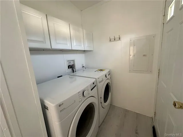a utility room with dryer and washer