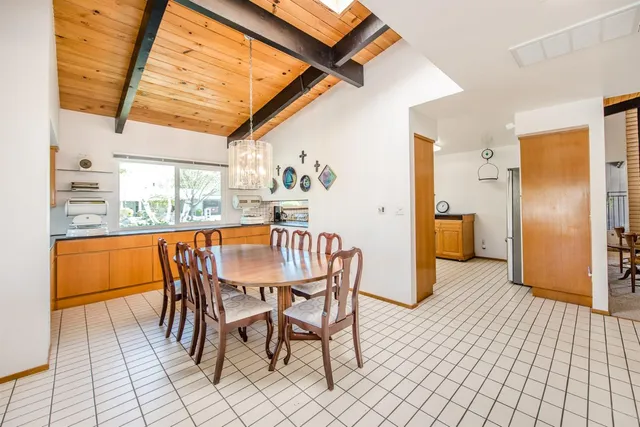 a living room with furniture or couch and a large window