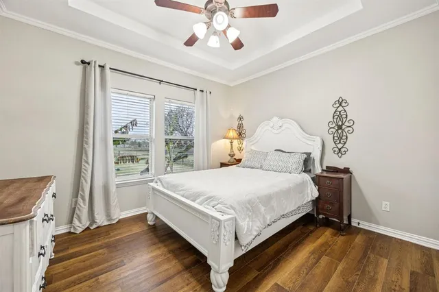 a bathroom with a toilet a sink and a mirror