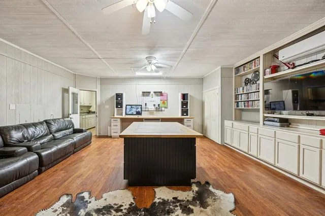 a room with furniture and chandelier