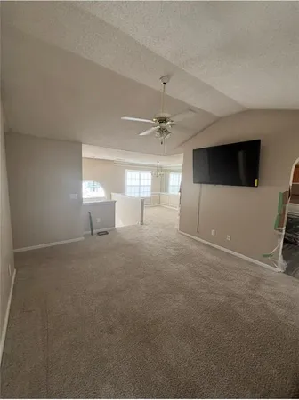 a view of a livingroom with a fireplace