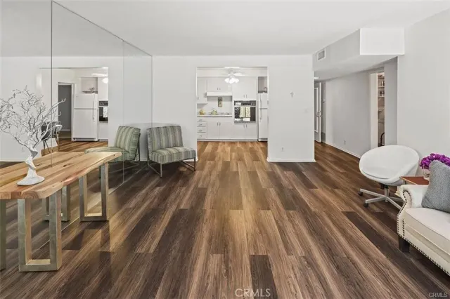 a view of a living room and dining room