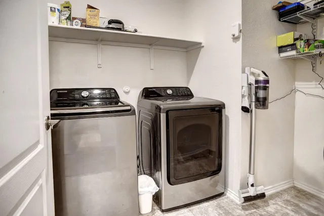 a bathroom with a shower and a sink