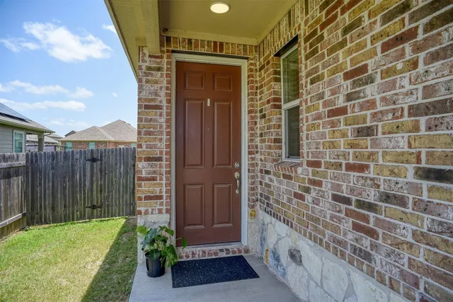a bathroom with a sink toilet a mirror and shower