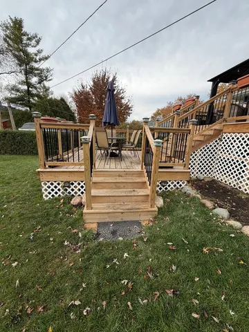 a view of a house with a small yard