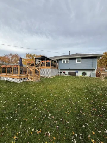 front view of a house with a big yard