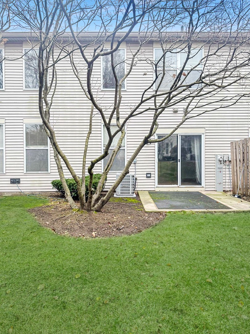 1533 Keystone Court Elgin, IL 60120 - Photo 15 of 15 a view of a house with a yard