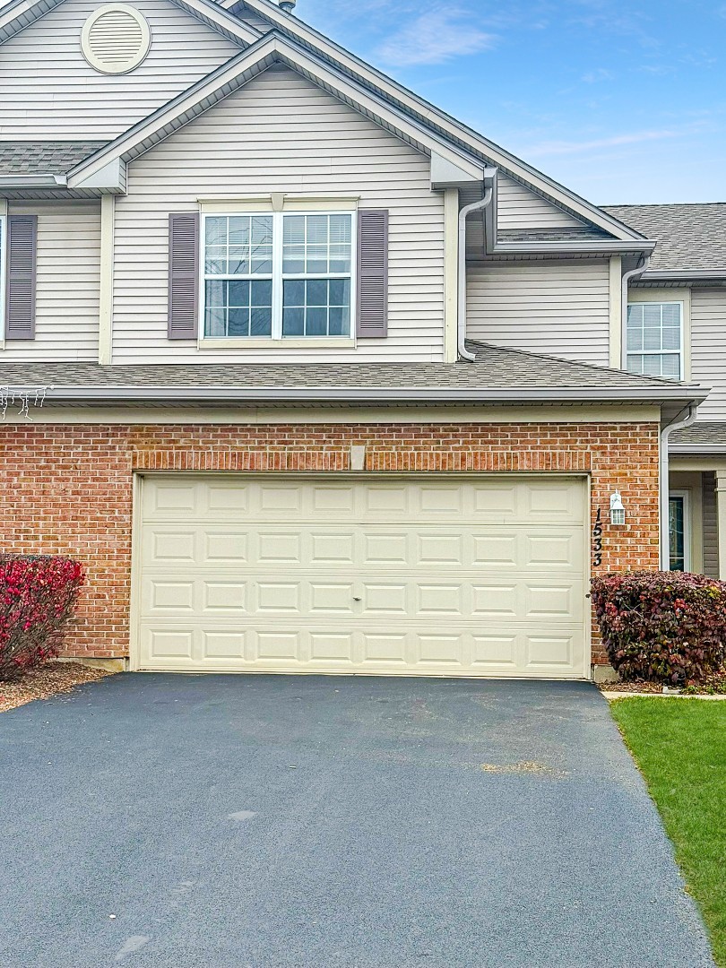 1533 Keystone Court Elgin, IL 60120 - Photo 2 of 15 front view of a house