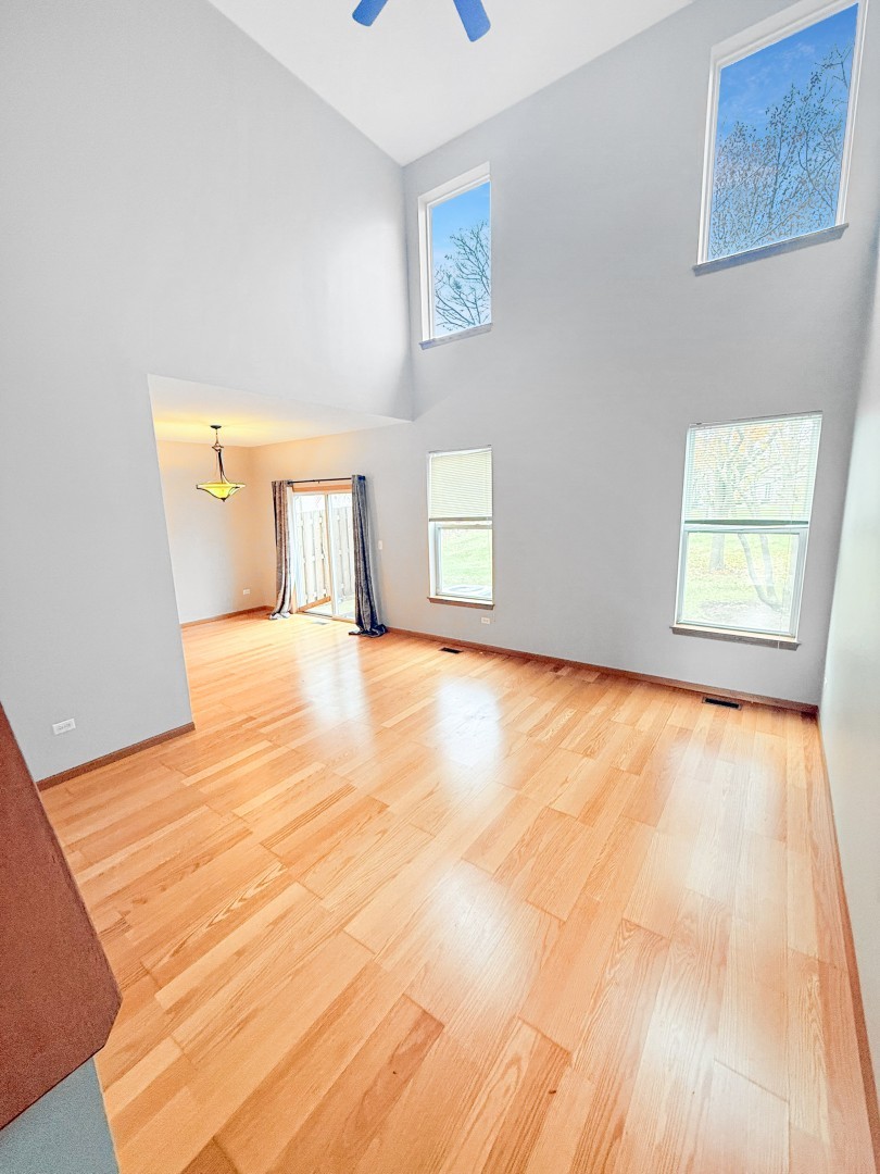1533 Keystone Court Elgin, IL 60120 - Photo 4 of 15 a view of an empty room with a window