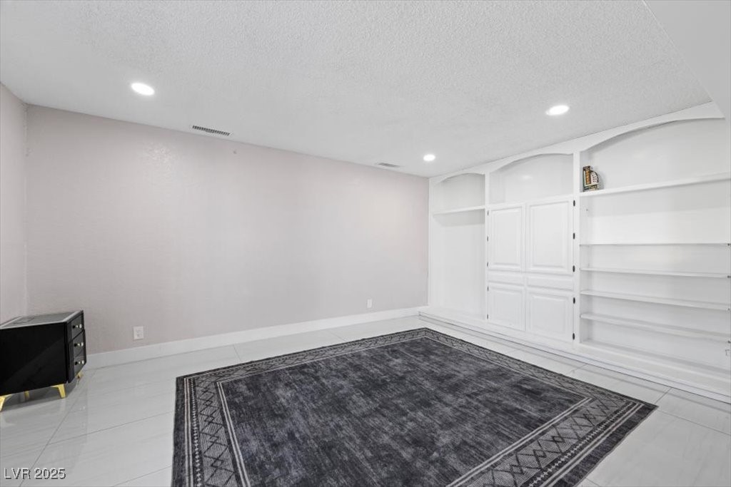 5110 Evaline Street Las Vegas, NV 89120 - Photo 14 of 55 Functional workspace with ample shelving and clean design!