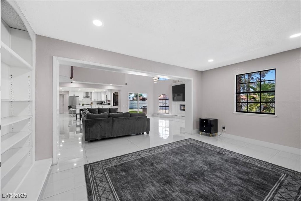 5110 Evaline Street Las Vegas, NV 89120 - Photo 15 of 55 Modern layout connects living room to versatile office space!