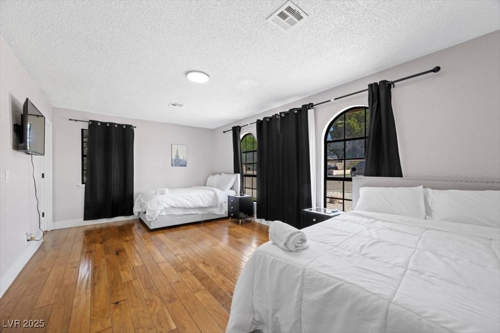 5110 Evaline Street Las Vegas, NV 89120 - Photo 18 of 55 Bright and versatile 2nd bedroom with dual sleeping areas and a private ensuite!