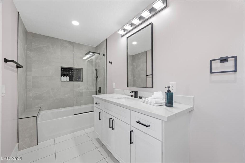 5110 Evaline Street Las Vegas, NV 89120 - Photo 19 of 55 2nd bedroom ensuite features bath with shower/tub combo and modern touches!