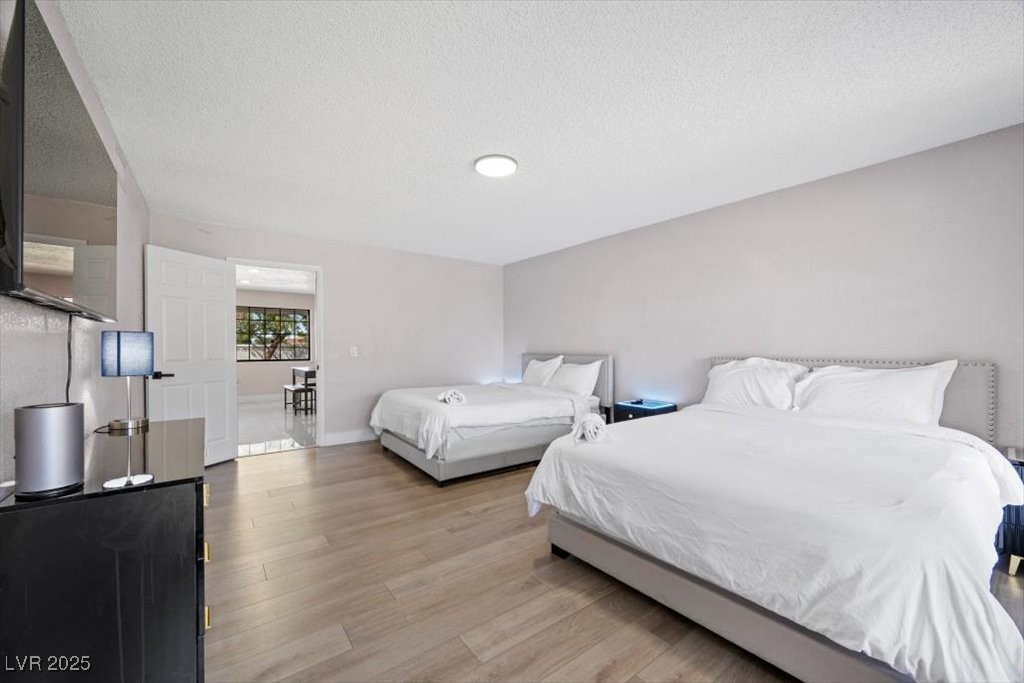 5110 Evaline Street Las Vegas, NV 89120 - Photo 21 of 55 Functional 3rd bedroom with TV and restful atmosphere!