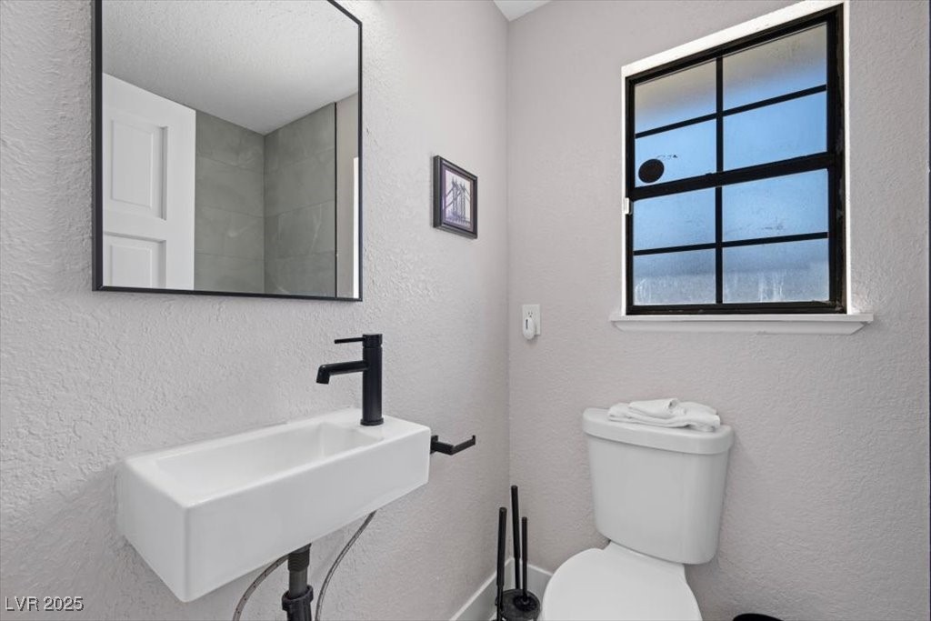 5110 Evaline Street Las Vegas, NV 89120 - Photo 23 of 55 Crisp and clean bath with shower and classic charm.