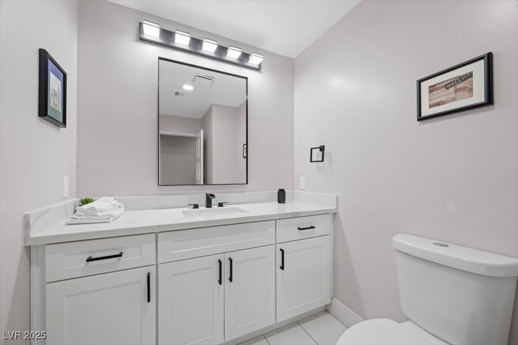 5110 Evaline Street Las Vegas, NV 89120 - Photo 25 of 55 Convenient bathroom with tasteful vanity and clean layout.