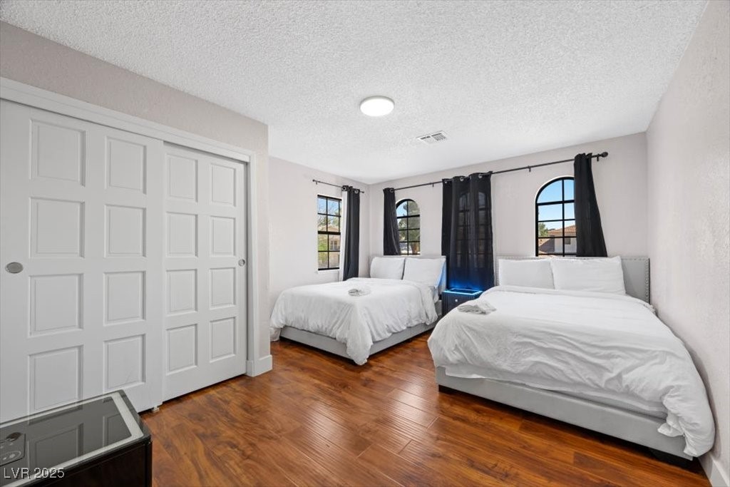 5110 Evaline Street Las Vegas, NV 89120 - Photo 28 of 55 Thoughtfully designed 5th bedroom with 2 beds provides a peaceful vibe.