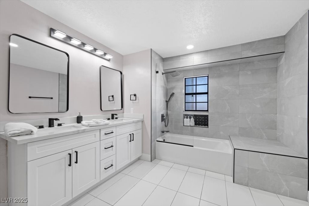 5110 Evaline Street Las Vegas, NV 89120 - Photo 30 of 55 Elegant bathroom retreat with dual sinks.