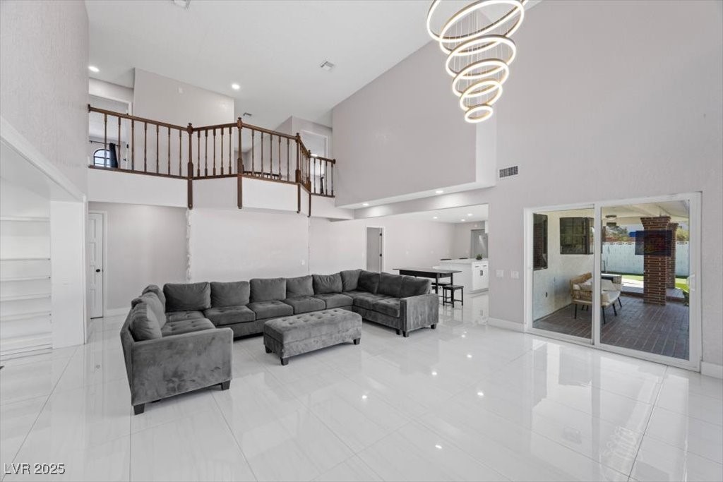 5110 Evaline Street Las Vegas, NV 89120 - Photo 3 of 55 Elegant living room with access to your own backyard oasis!