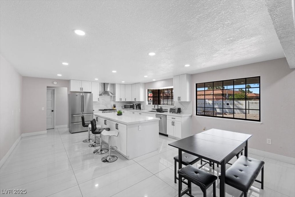 5110 Evaline Street Las Vegas, NV 89120 - Photo 6 of 55 Seamless flow between kitchen and dining for effortless entertaining!