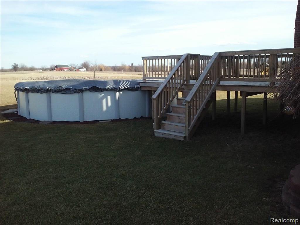 4660 Capac Road Capac, MI 48014 - Photo 54 of 65 This is another view of the deck and pool.
