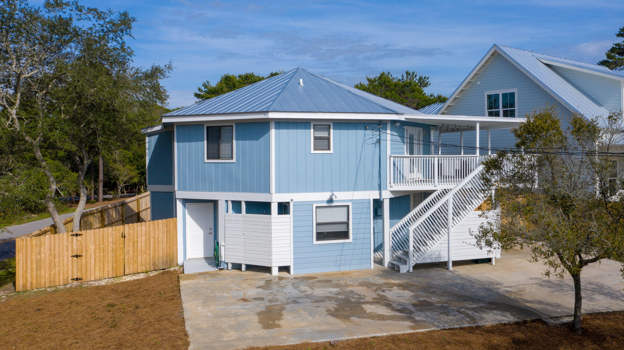 138 Crescent Road Santa Rosa Beach, FL 32459 - Photo 4 of 48 a front view of a house with a yard