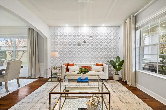 a view of a dining room with furniture window and wooden floor