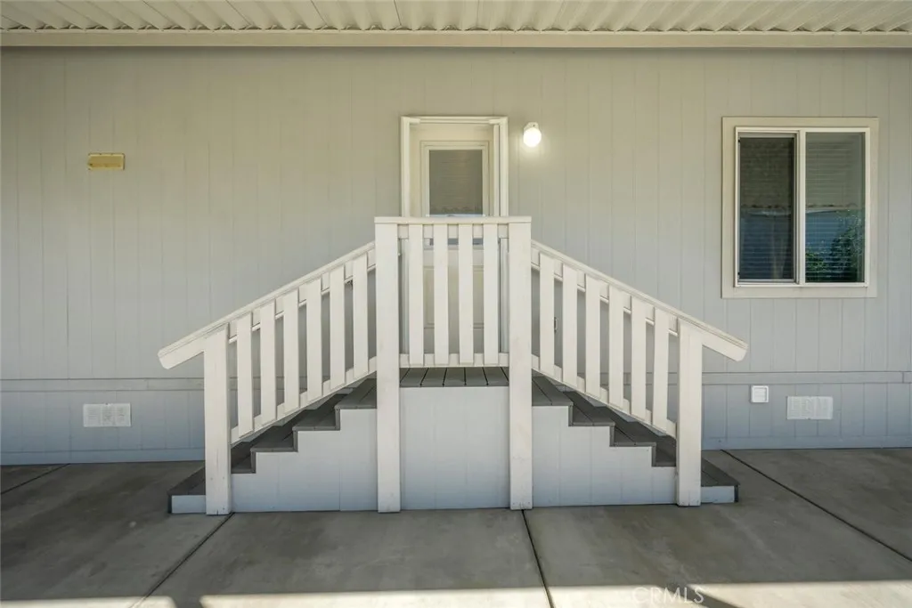 16222 Monterey Lane, Unit 285 Huntington Beach, CA 92649 - Photo 43 of 59 a view of a house with a deck
