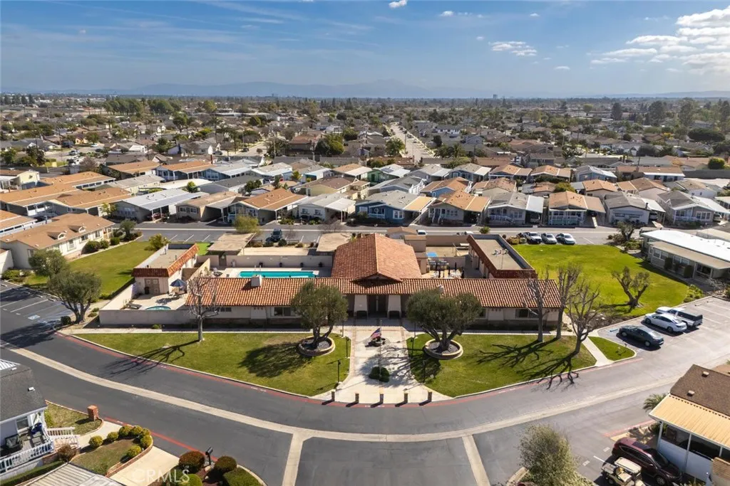 16222 Monterey Lane, Unit 285 Huntington Beach, CA 92649 - Photo 59 of 59 an aerial view of a house with a swimming pool