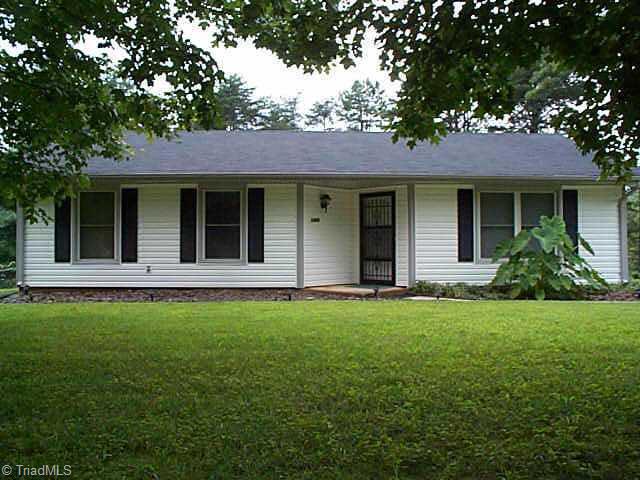 1495 Pebblebrook Road Winston-Salem, NC 27105 - Photo 1 of 7 Exterior Front. front view, blocked from street by trees