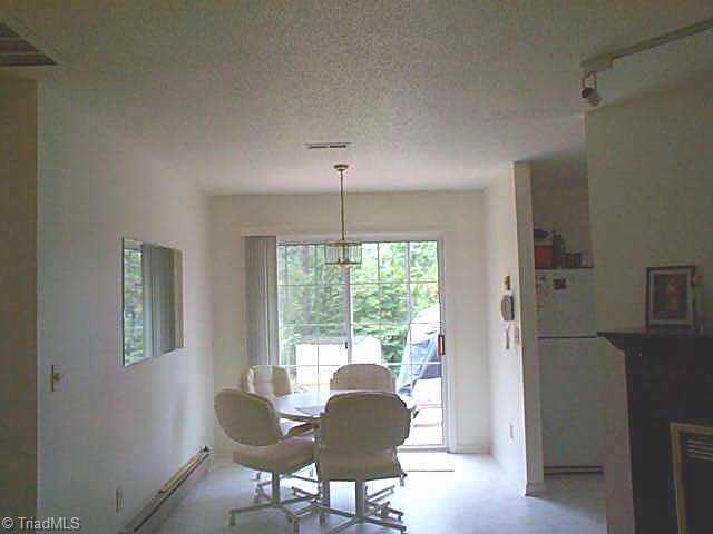 1495 Pebblebrook Road Winston-Salem, NC 27105 - Photo 3 of 7 Other. dining area looks out onto backyard