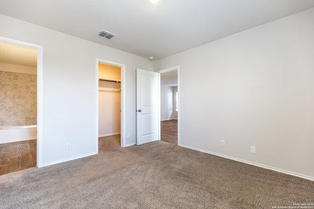 an empty room with a natural light