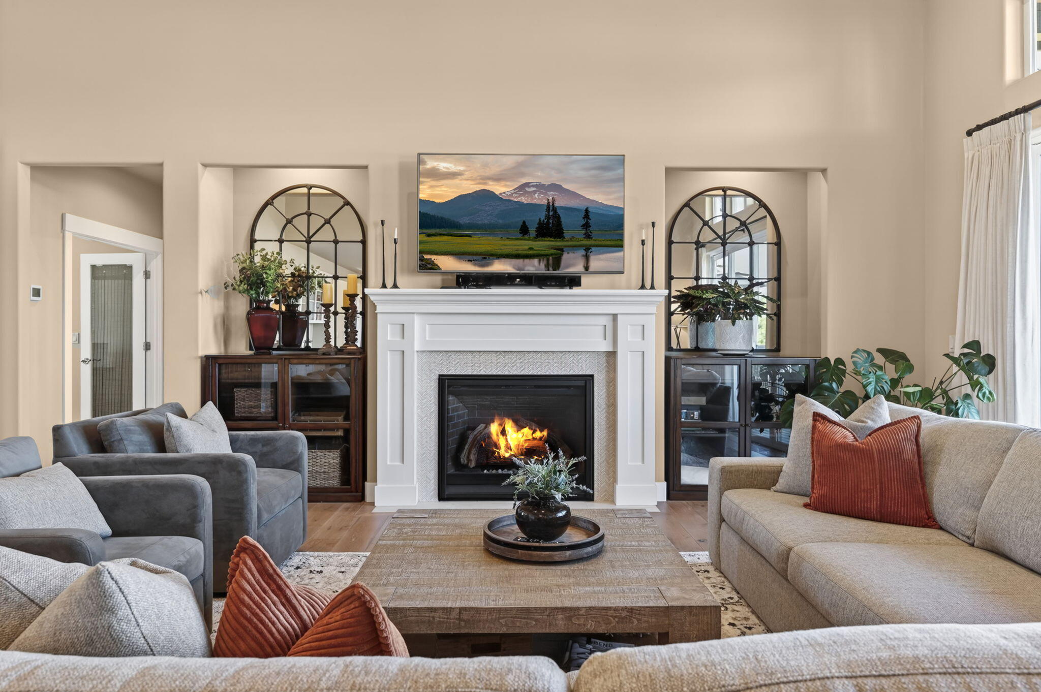 66355 Barr Road Bend, OR 97703 - Photo 11 of 56 a living room with furniture fireplace and flat screen tv