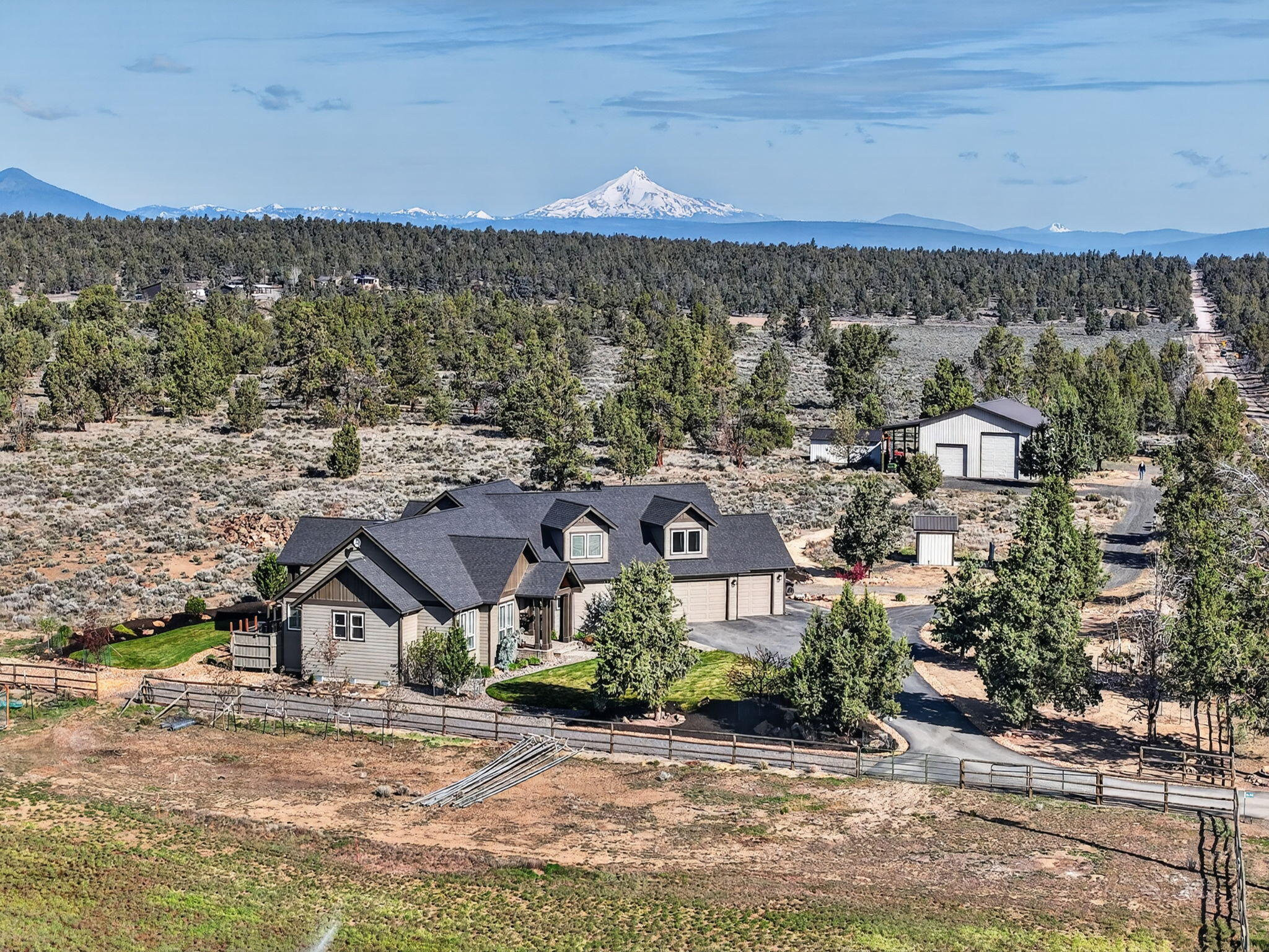 66355 Barr Road Bend, OR 97703 - Photo 2 of 56 an aerial view of a house with a yard