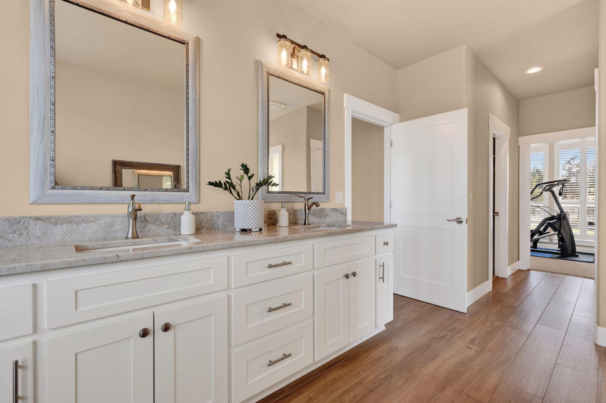 66355 Barr Road Bend, OR 97703 - Photo 25 of 56 a bathroom with double sink and a mirror