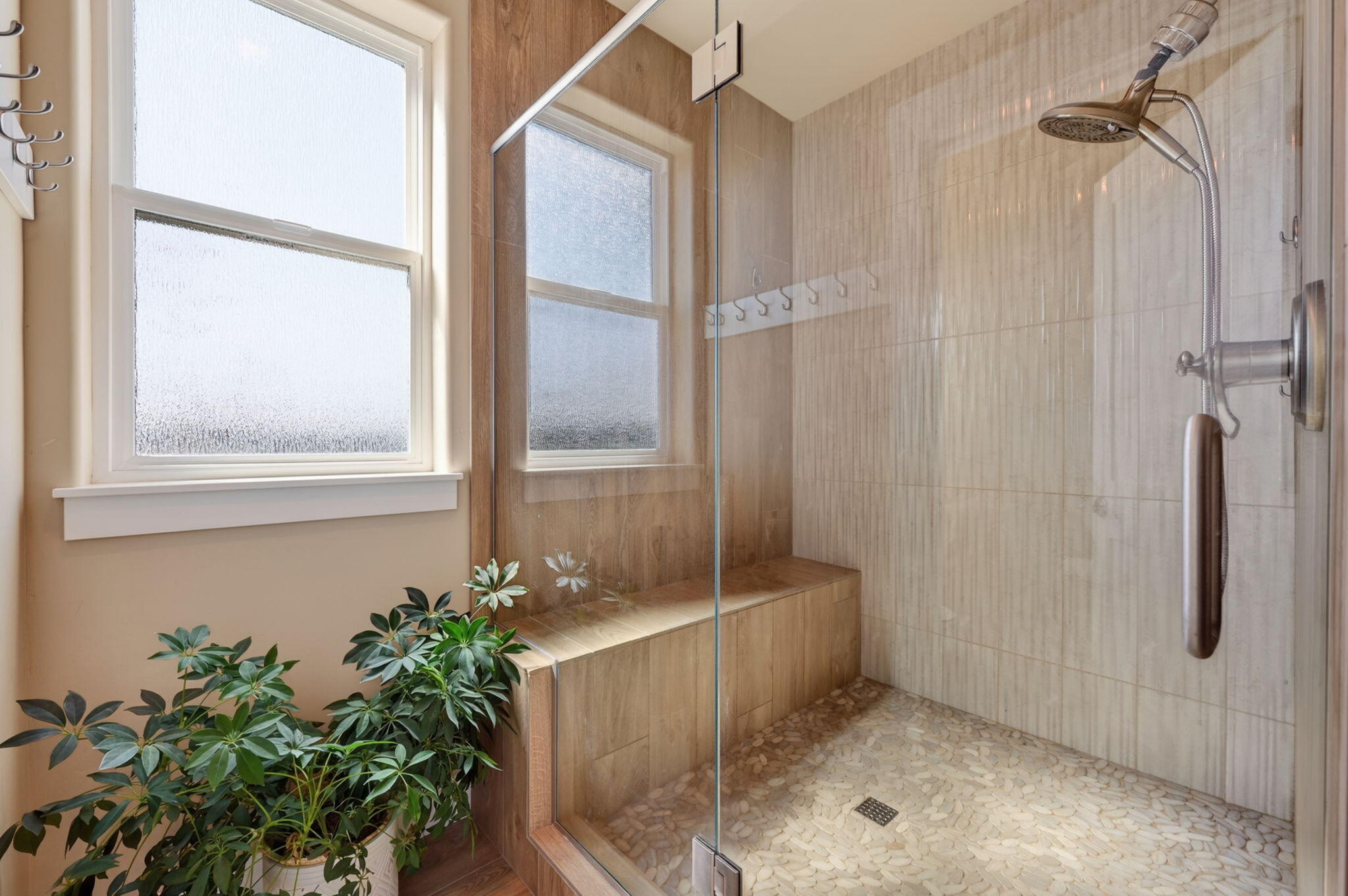 66355 Barr Road Bend, OR 97703 - Photo 26 of 56 a bathroom with a tub and shower
