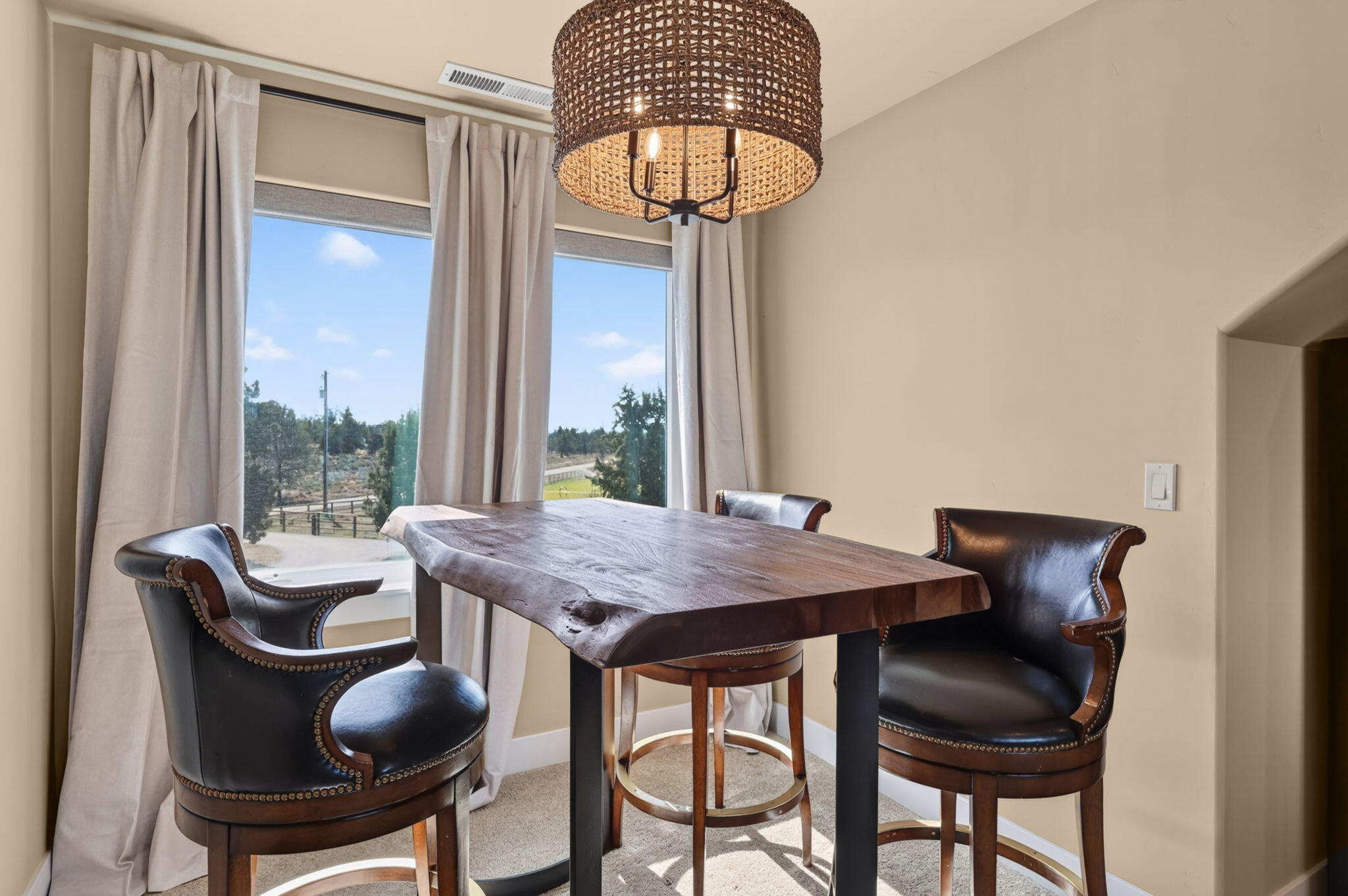 66355 Barr Road Bend, OR 97703 - Photo 40 of 56 a dining room with furniture and window