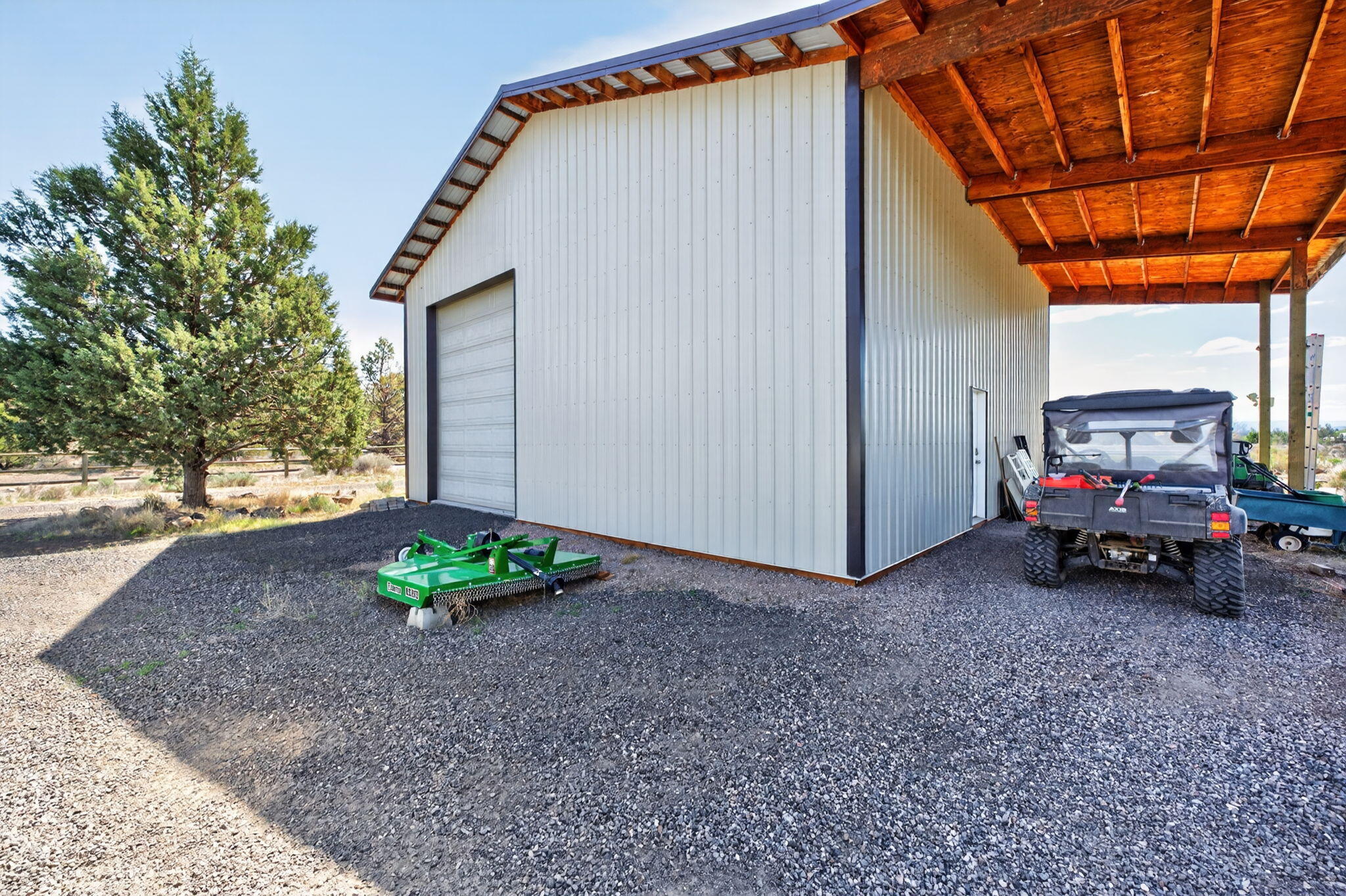 66355 Barr Road Bend, OR 97703 - Photo 49 of 56 a view of a house with a cars park