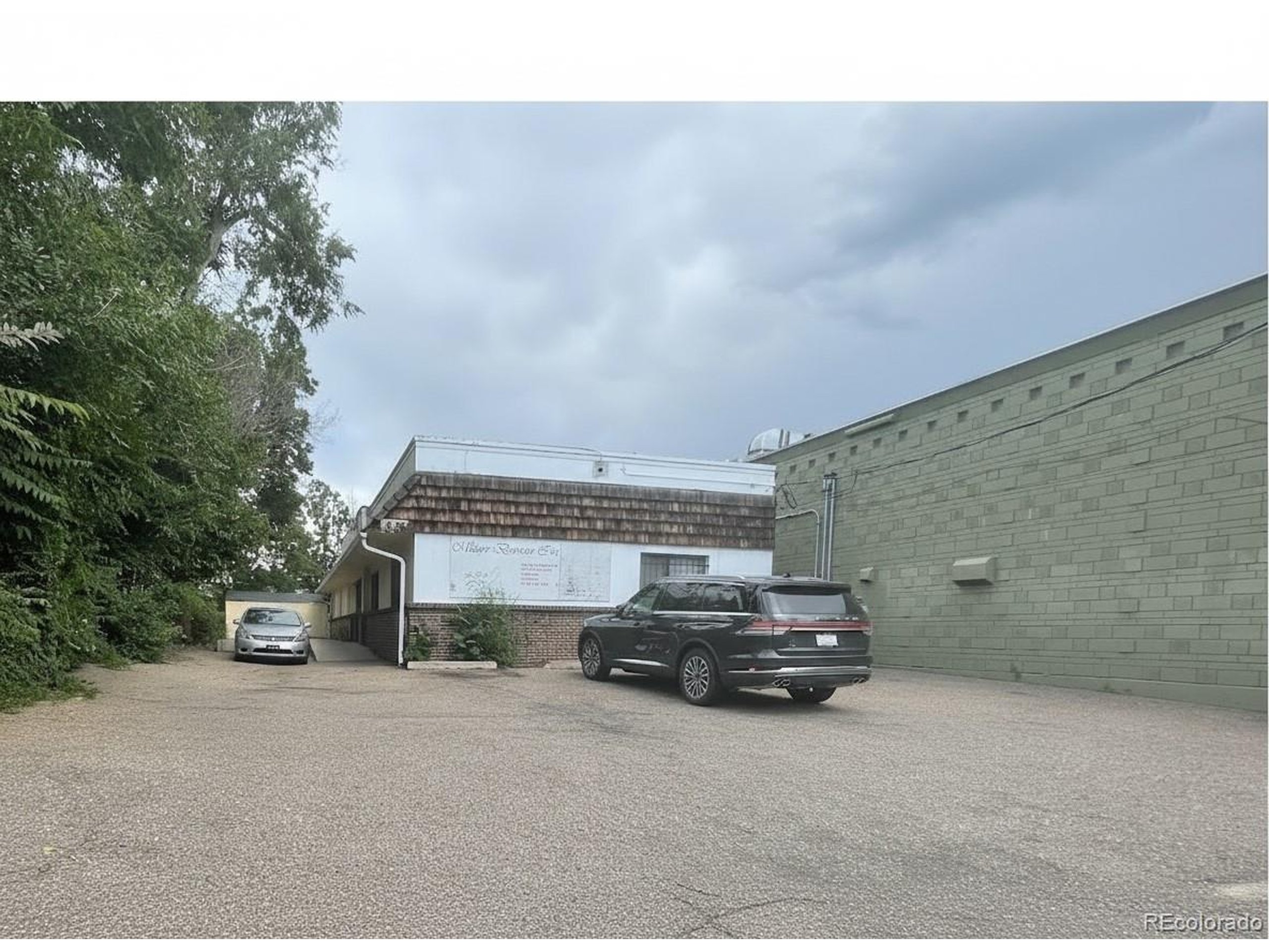 536 Cherokee Street Denver, CO 80204 - Photo 16 of 37 a car parked on the side of the road
