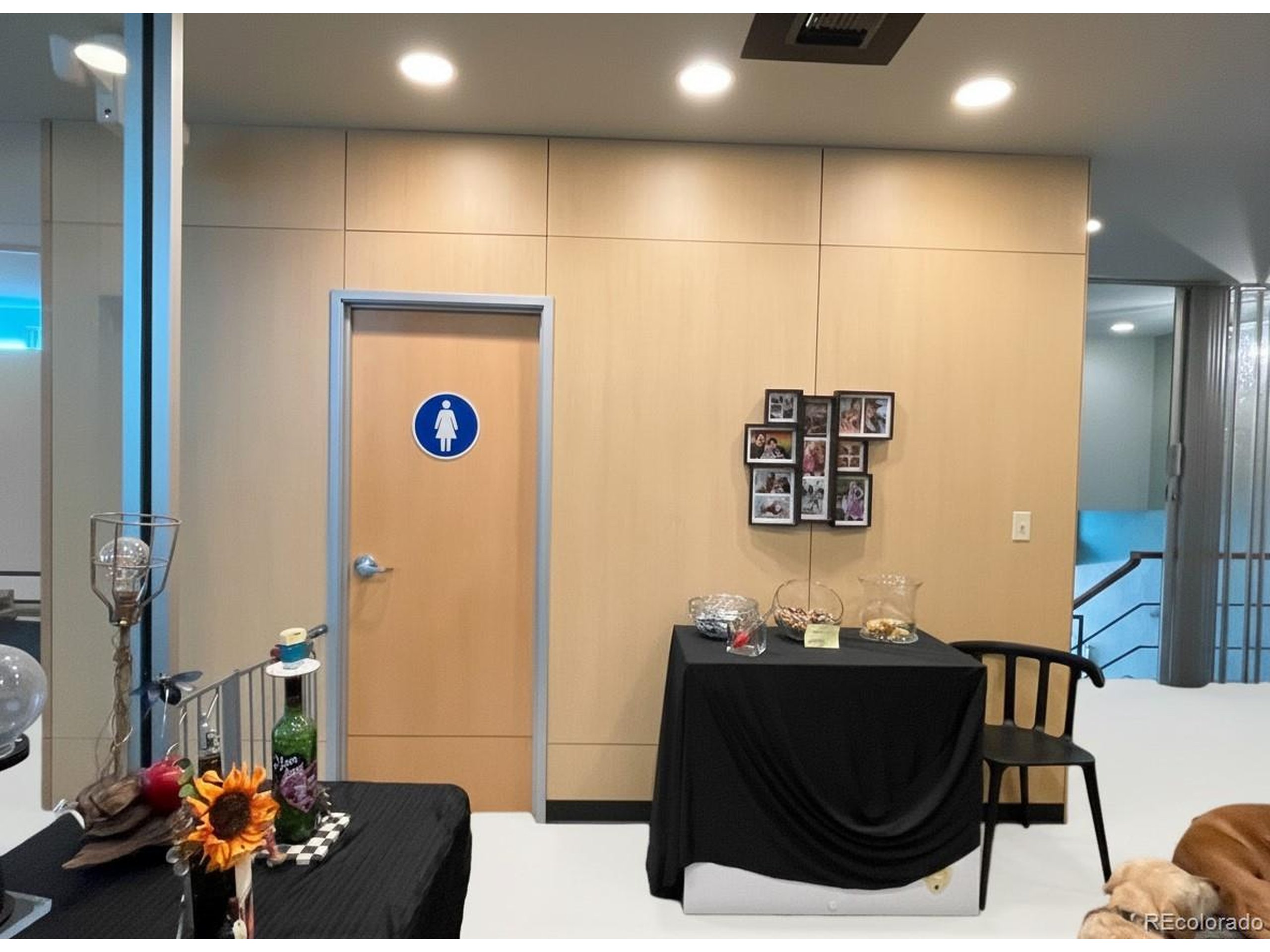 536 Cherokee Street Denver, CO 80204 - Photo 21 of 37 a living room with a couch and a table with wooden floor