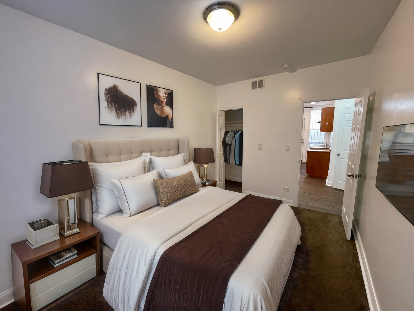 1635 West 57th Street, Unit 1 Chicago, IL 60636 - Photo 14 of 16 a bedroom with bed and a night stand