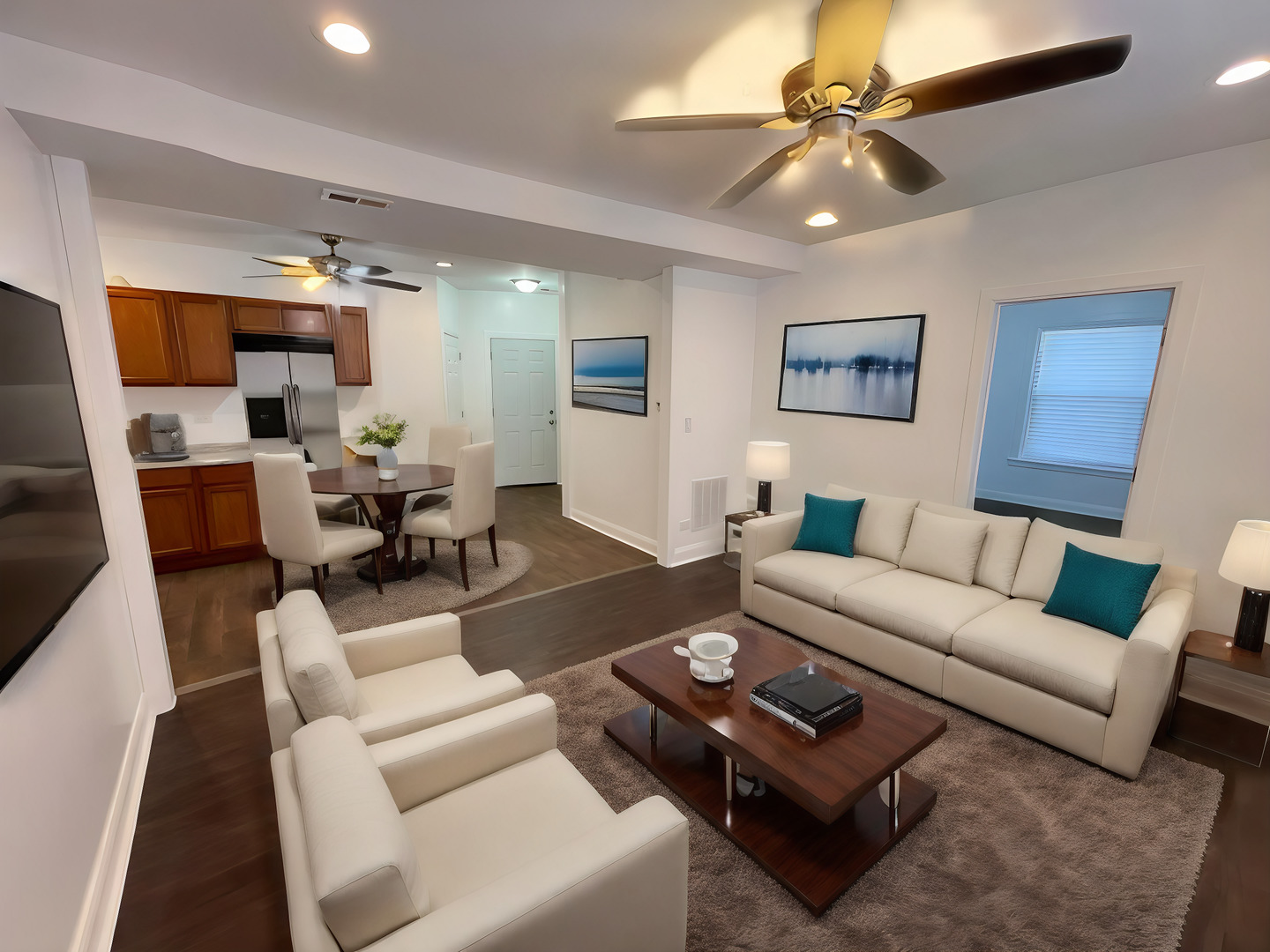 1635 West 57th Street, Unit 1 Chicago, IL 60636 - Photo 7 of 16 a living room with furniture and a chandelier