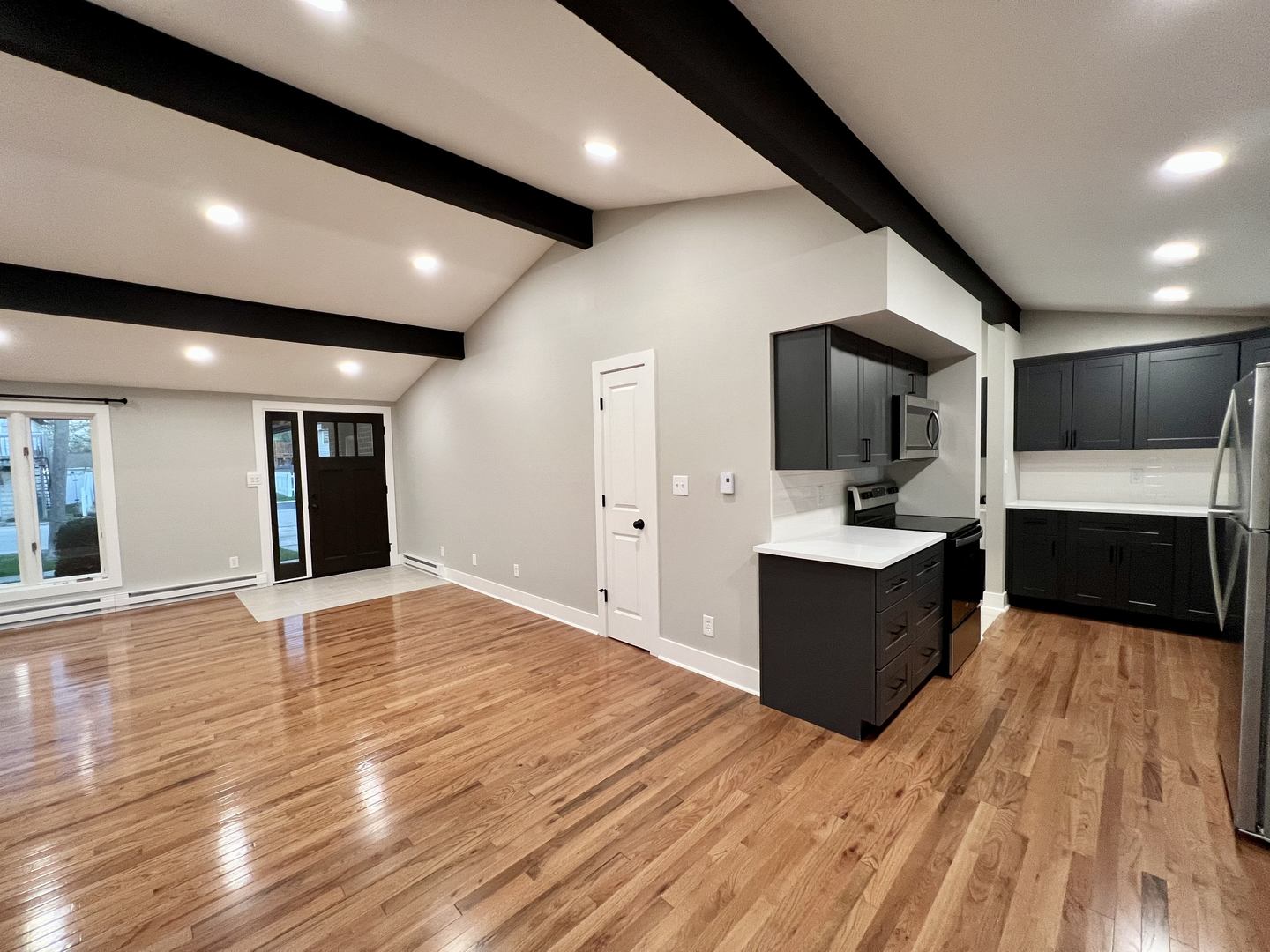 515 South Street Lockport, IL 60441 - Photo 6 of 22 a large room with wooden floor and a sink