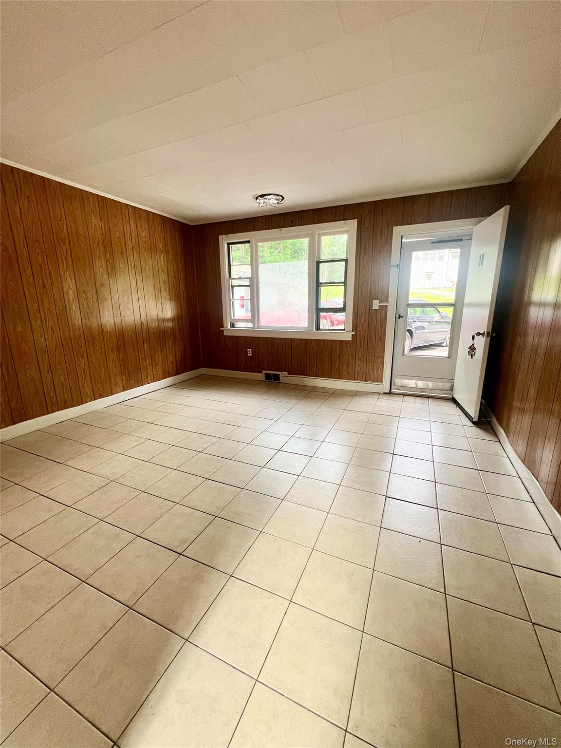 1612-1616 Rte 9W, Unit 18 Milton, NY 12547 - Photo 3 of 6 a view of a livingroom with a staircase