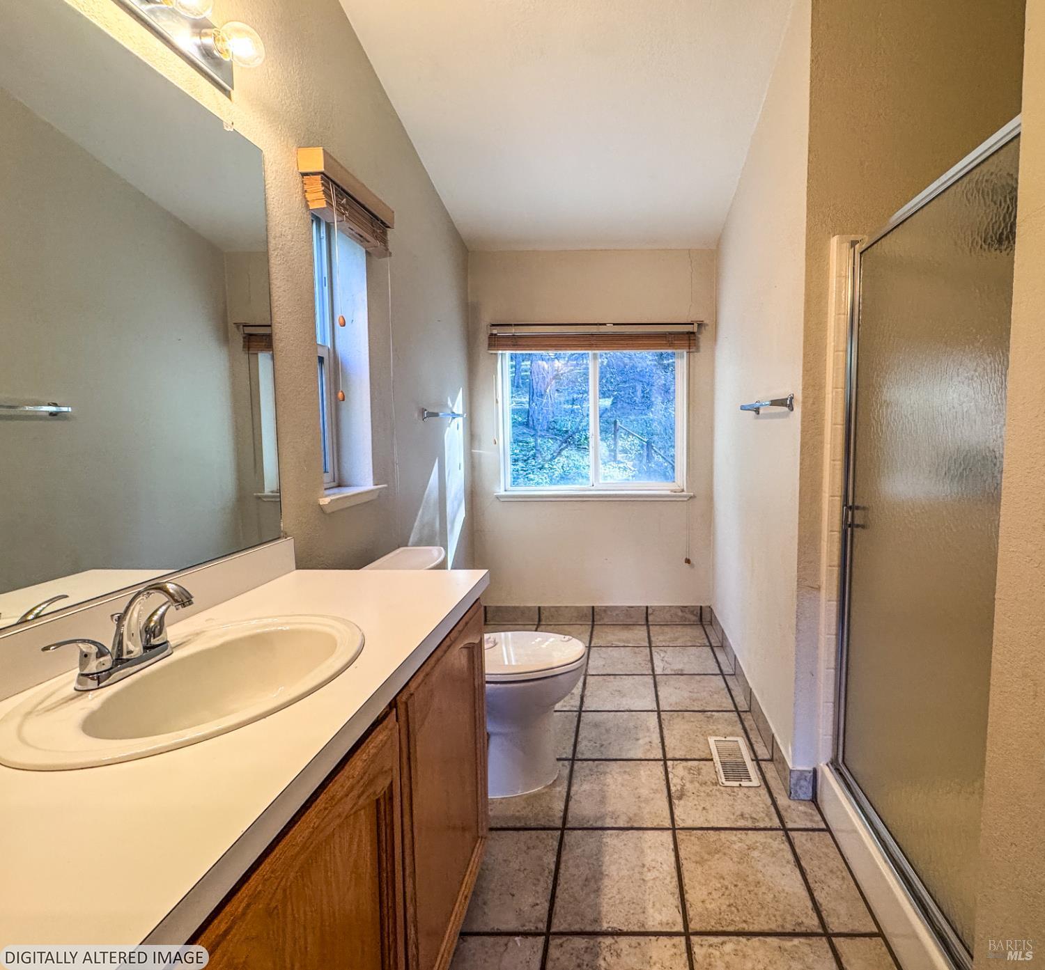 14475 Poonkinney Road Dos Rios, CA 95429 - Photo 18 of 25 a bathroom with a sink toilet and shower