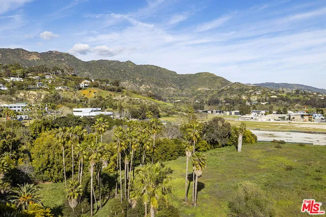 a view of lake with mountain
