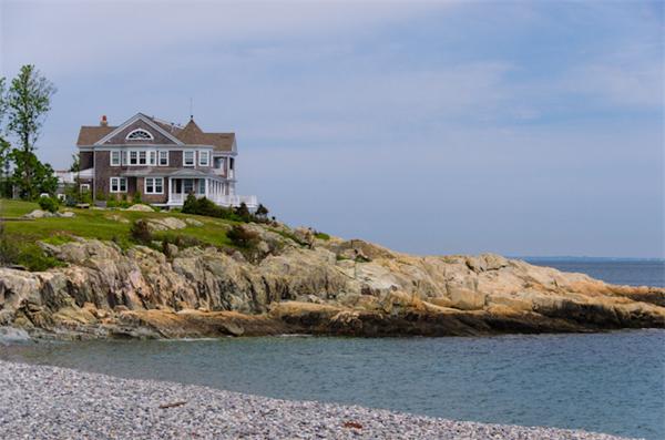 a wooden bench sitting in middle of a yard