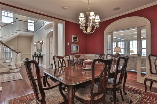 369 Jerusalem Road Cohasset, MA 02025 - Photo 11 of 30 a view of a dining room with furniture a chandelier and wooden floor
