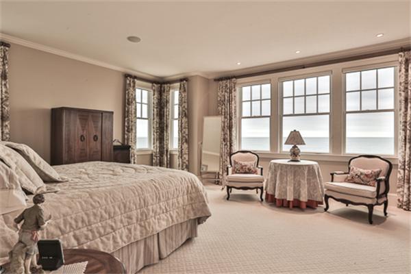 369 Jerusalem Road Cohasset, MA 02025 - Photo 12 of 30 a bedroom with bed and glass window